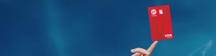 Virgin Money Anytime Rewards Credit Card Hand holding Virgin Money Anytime Rewards credit card, focused on flexible points and cashback features