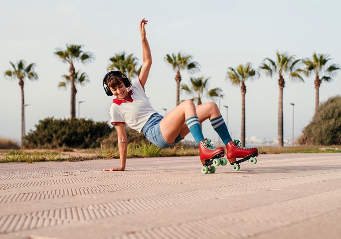 Woman rollarblades 0% p.a. on balance transfers for 15 months.